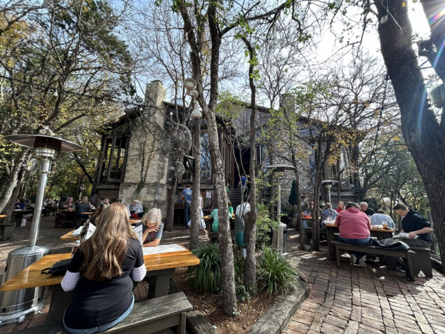 One of the outdoor seating areas at the Gristmill River Restaurant & Bar along the Guadalupe River in the Gruene Historic District.