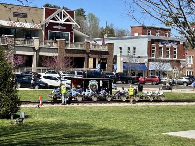 A group returns to the City Park in Blue Ridge, Georgia from their morning rail bike excursion.