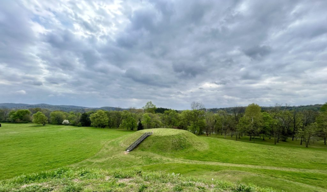 Blue-grey clouds slip over the verdant fields that was once the Etowahan village.