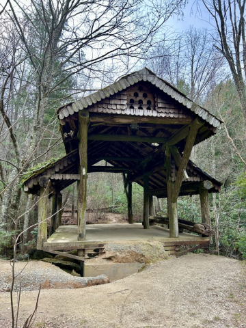 Old Pavilion structure over water falls near Dillard, GA