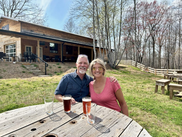 Curtis and Laura and the quaint setting outside 52 West Brewing in Dahlonega, GA.