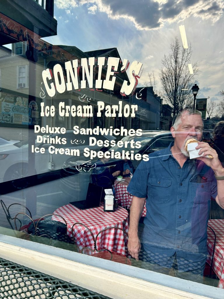 Curtis enjoys an ice cream cone (*shocking*) at Connie's Ice Cream Parlor in Dahlonega, Georgia.